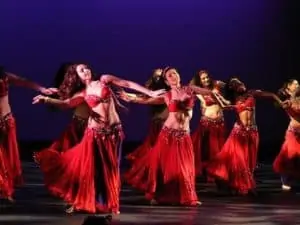 Belly dancers in red dresses