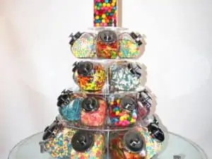 Candies on circular glass shelves and table