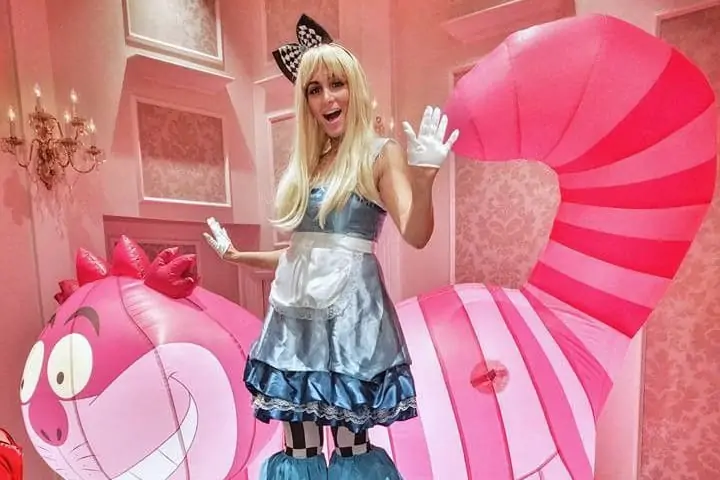 Stilwalker and inflatable cat