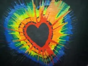Colourful heart painted on black T-Shirt