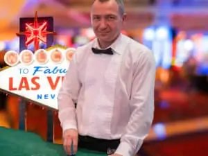 Casino dealer with vegas screen backdrop