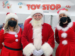 Holiday drive thru Santa with elves toys