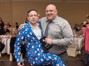 Holiday party men in xmas suit