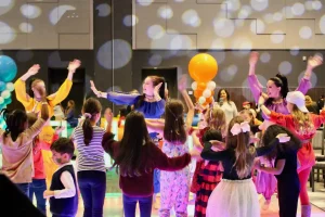 Kids following Bollywood dancers